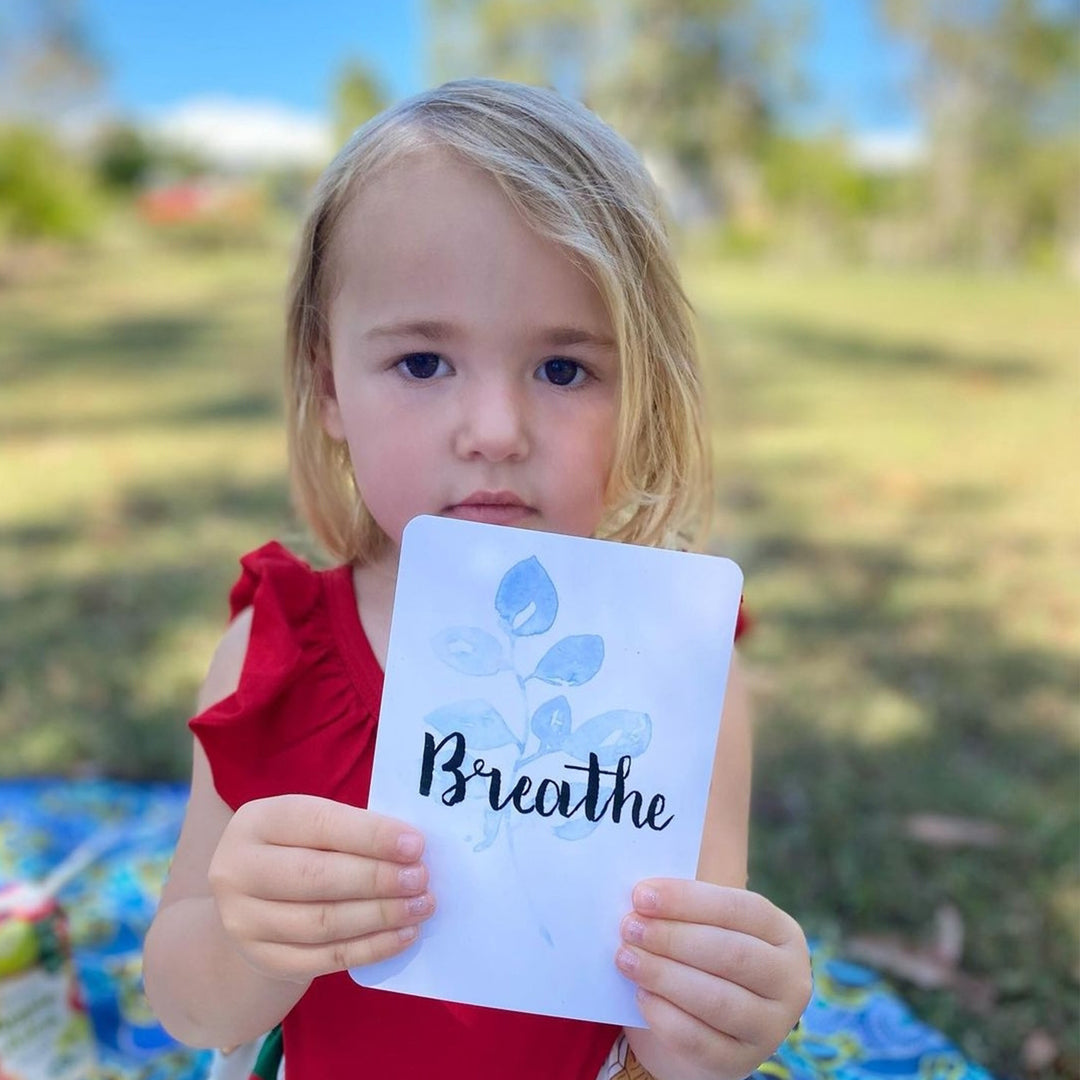 positive affirmation card being used by child